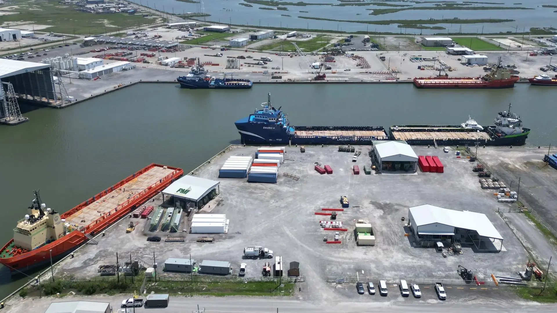 Aerial view of the PMI cleaning dock with offshore supply vessels alongside