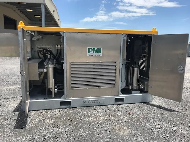 MudHog unit with its doors open, showing the pumps and filter pots
